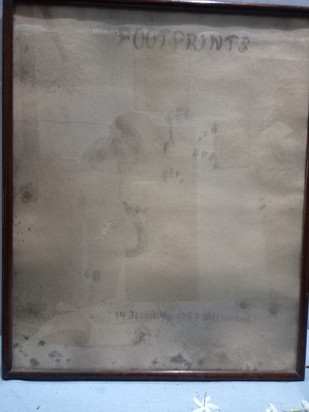 Footprints of neem karoli baba on the wall